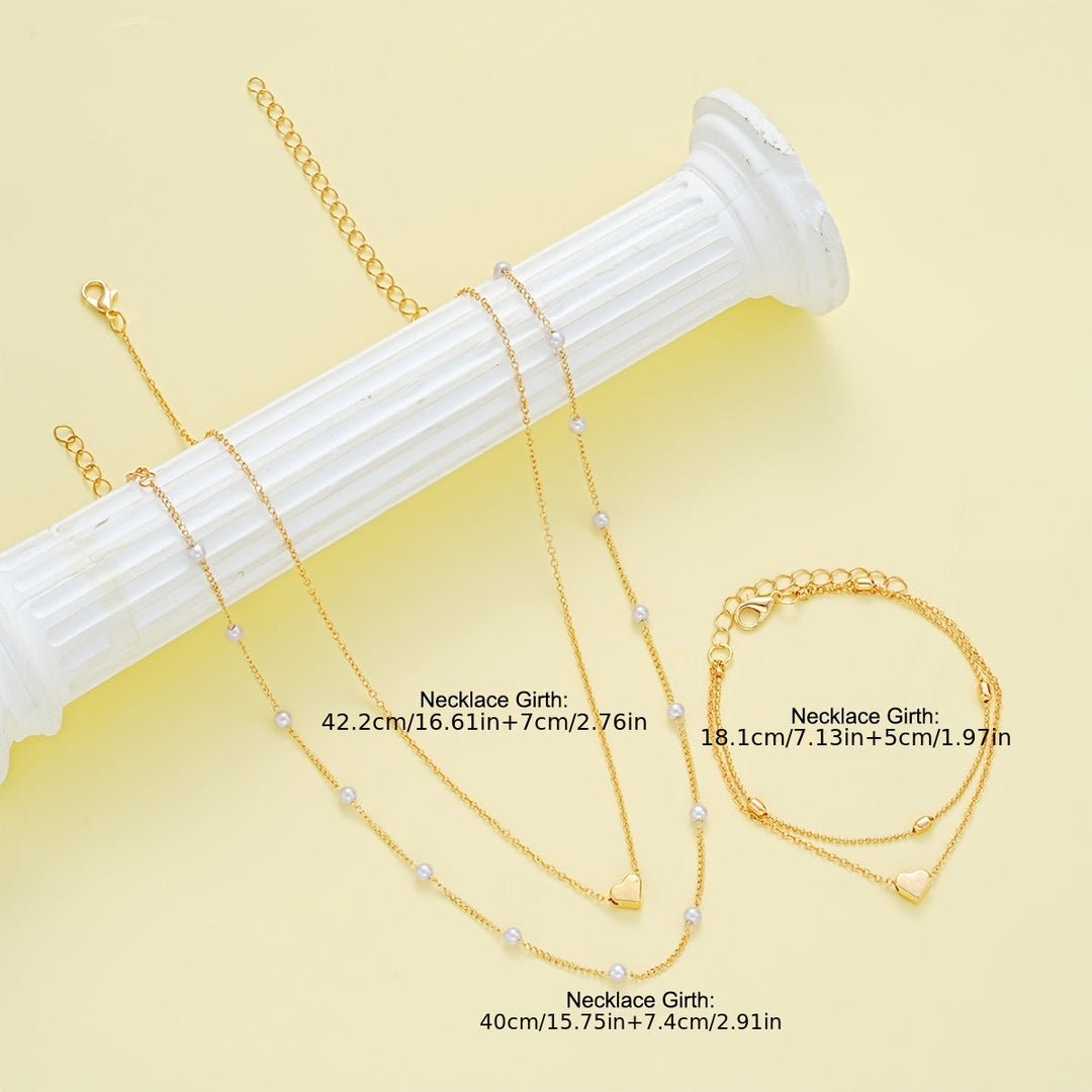 LAYERED HEART & PEARL JEWELRY SET